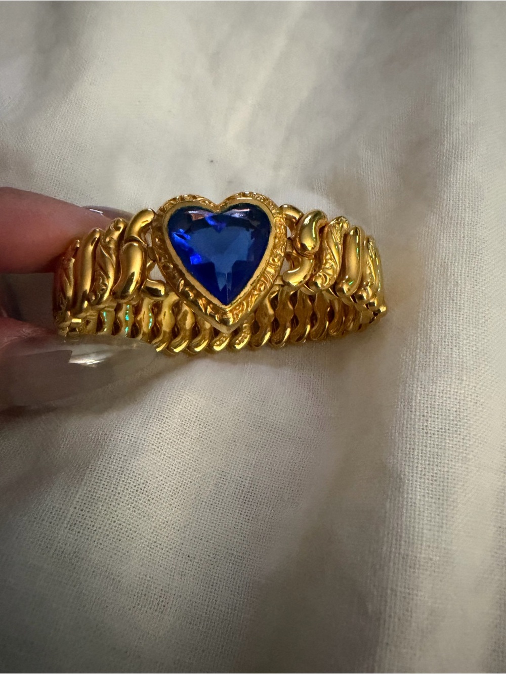 Gold Bracelet with Heart-Shaped Blue Gemstone